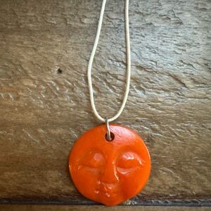 NIB Orange Sun Face Pendant Necklace